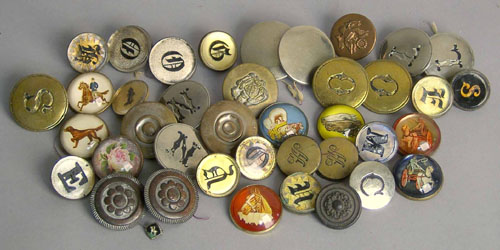 Appraisal: Group of lead and brass brooches buttons etc