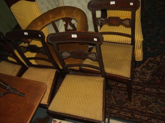 Appraisal: A set of four Georgian mahogany dining chairs with pierced