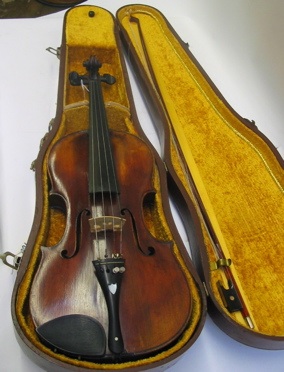 Appraisal: A ROSEWOOD VIOLIN AND BOW complete with a fitted wood