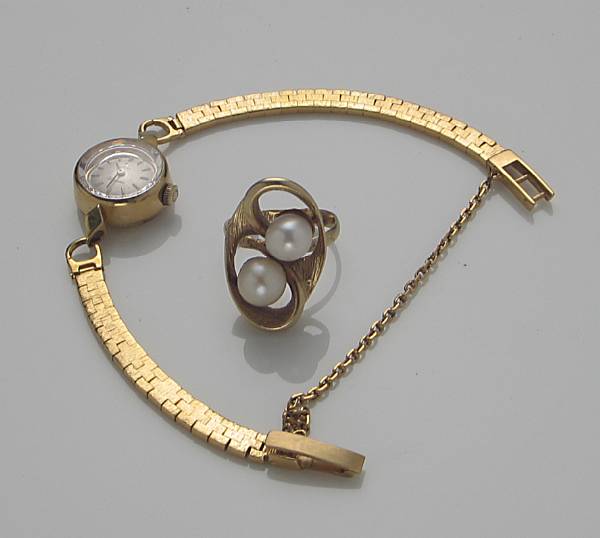 Appraisal: A lady's k and k gold wristwatch Omega together with