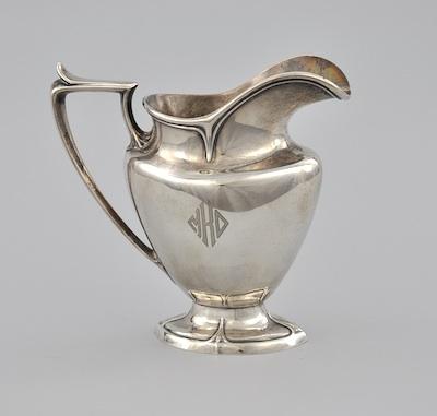 Appraisal: A Small Sterling Pitcher by Durgin Elegant small pitcher with