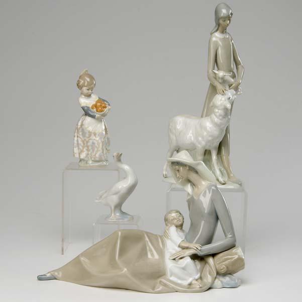 Appraisal: LLADRO FIGURES Tall figure of a woman with sheep young