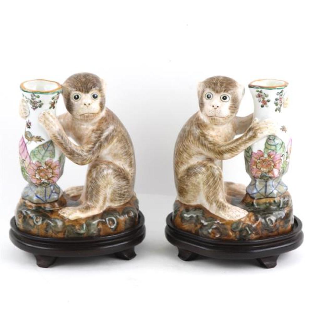 Appraisal: PAIR HAND PAINTED CHINESE FAMILLE ROSE PORCELAIN MONKEY FIGURES HOLDING