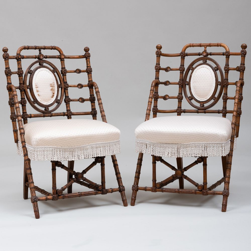 Appraisal: Pair of Neo-Grec Walnut Parlor Chairs Stamped Hunzinger Stamped 'Hunzinger