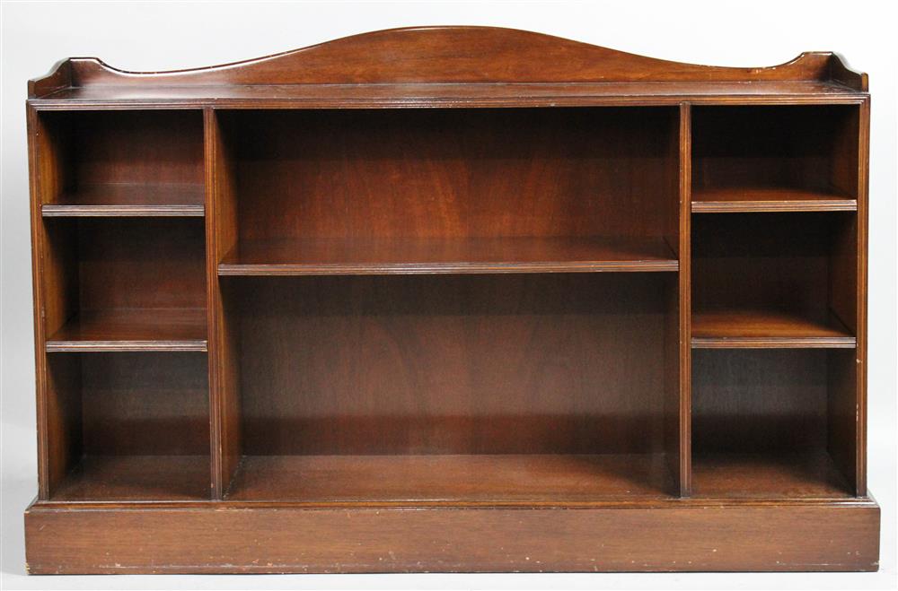 Appraisal: SMITH WATSON MAHOGANY LOW BOOKCASE arched shaped crest above a