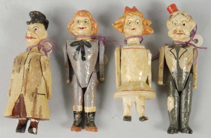 Appraisal: Lot of Early Wooden Jointed Comic Figures Description Circa Exquisitely