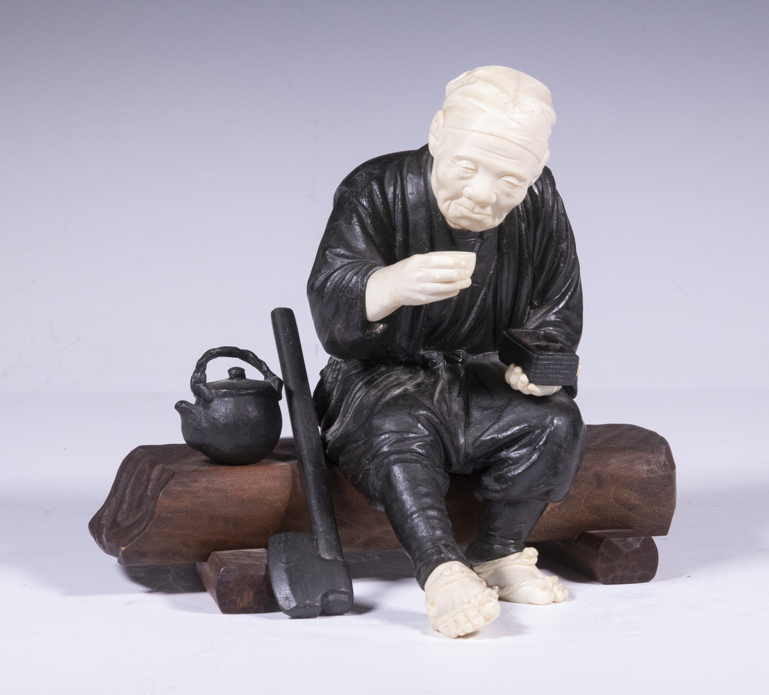 Appraisal: TH C JAPANESE BRONZE AND IVORY OKIMONO A Carpenter having