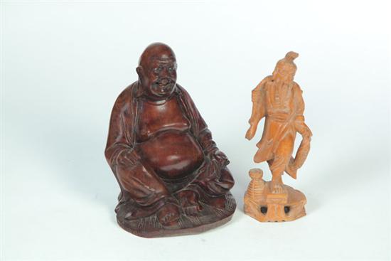 Appraisal: TWO WOODEN CARVINGS Asian th century Seated Buddha with inset