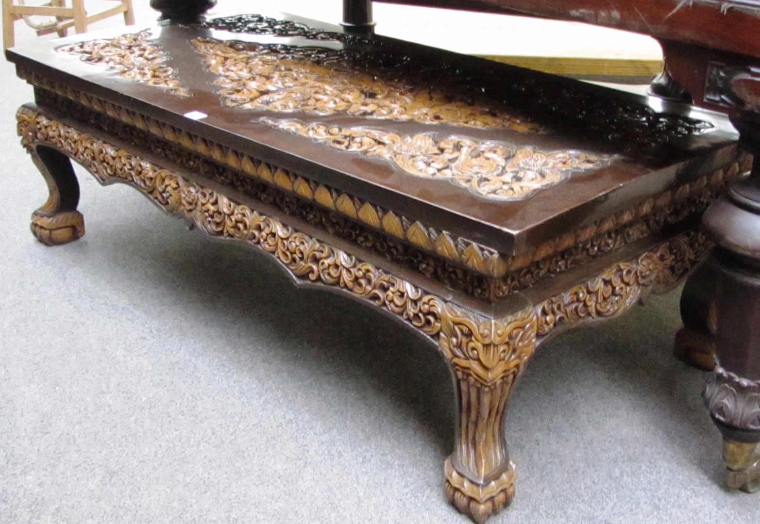 Appraisal: A th century Thai rectangular hardwood coffee table with carved