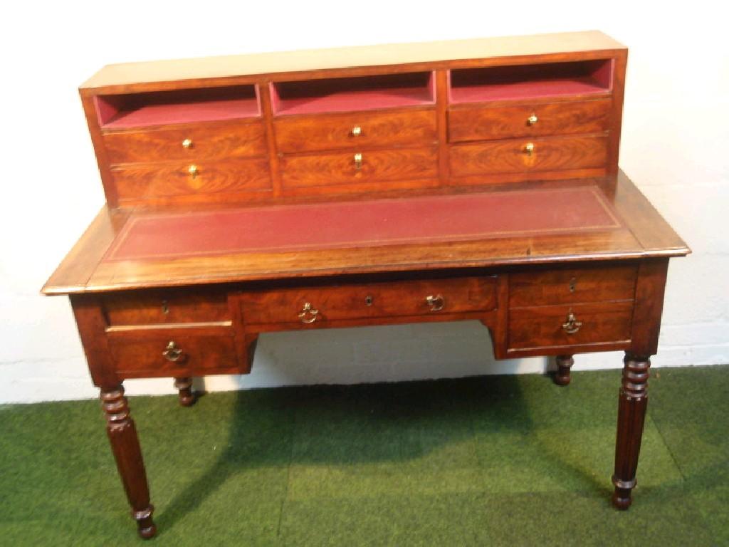 Appraisal: A thC mahogany banker's desk with raised drawer compartment to