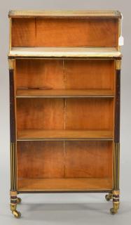 Appraisal: Satinwood and mahogany bookcase with inset marble brass trim and