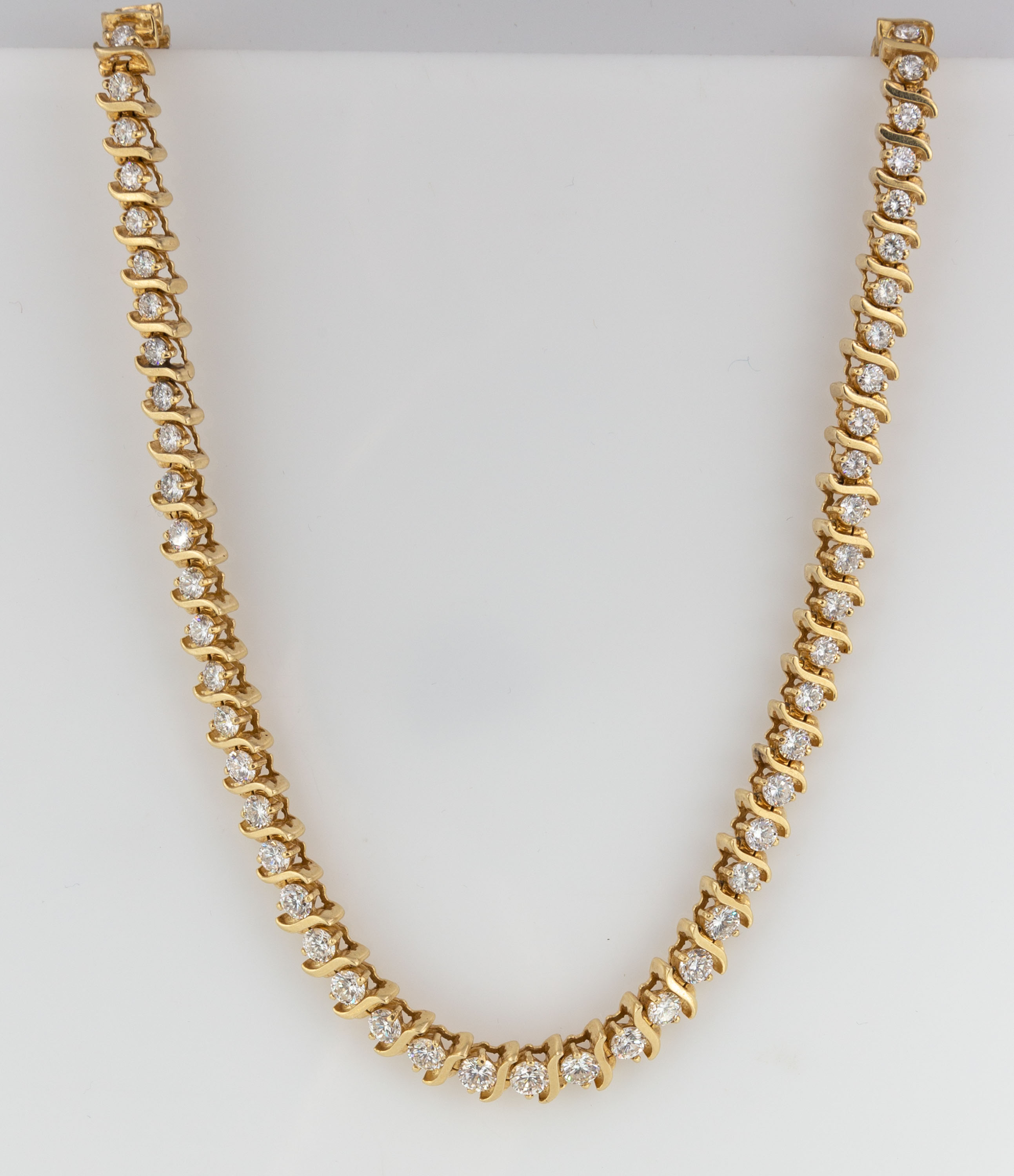 Appraisal: K GOLD AND DIAMOND NECKLACE WITH MATCHING BRACELET grams Necklace