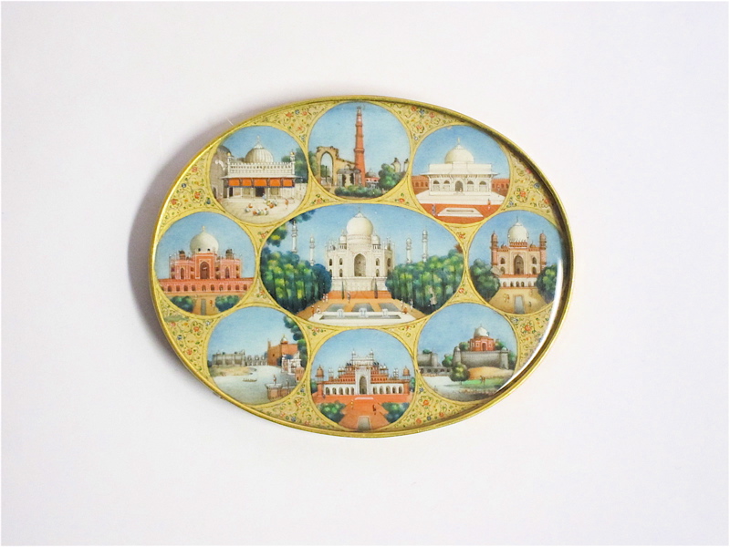 Appraisal: HAND PAINTED INDIAN OVAL GOLD FRAMED ORNAMENTAL PLAQUE having architectural