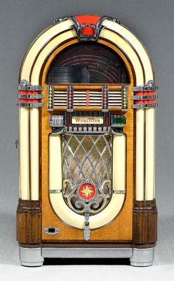 Appraisal: Wurlitzer jukebox tiger maple and walnut veneers metal tag at