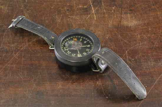 Appraisal: A World War II German Luftwaffe pilot's Kadlec armband compass