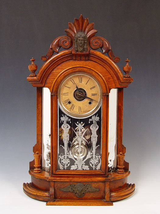 Appraisal: ANSONIA TRIUMPH MIRROR OAK CASE MANTLE CLOCK Masqueron embellishment on