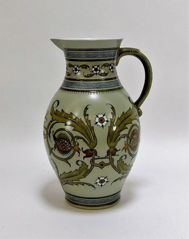 Appraisal: German Mettlach Floral Relief Stoneware Pitcher Germany th Century Relief