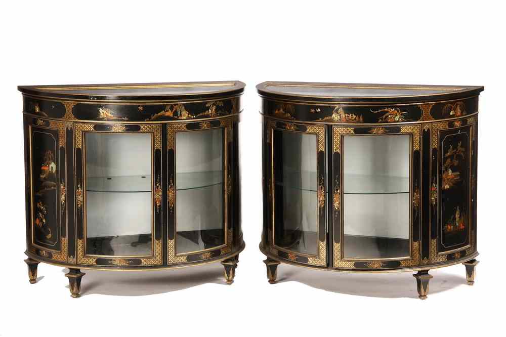 Appraisal: PAIR CHINOISERIE DEMILUNE CABINETS - th c Black Lacquered and