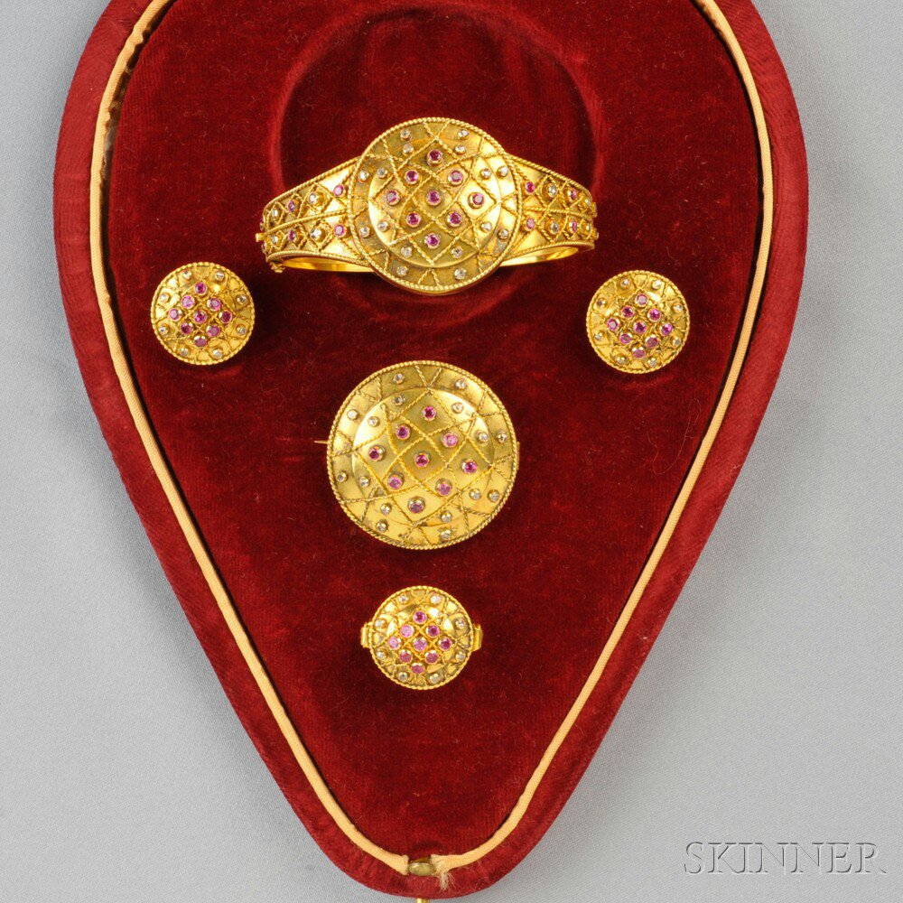 Appraisal: kt Gold Ruby and Diamond Suite comprising a hinged bangle