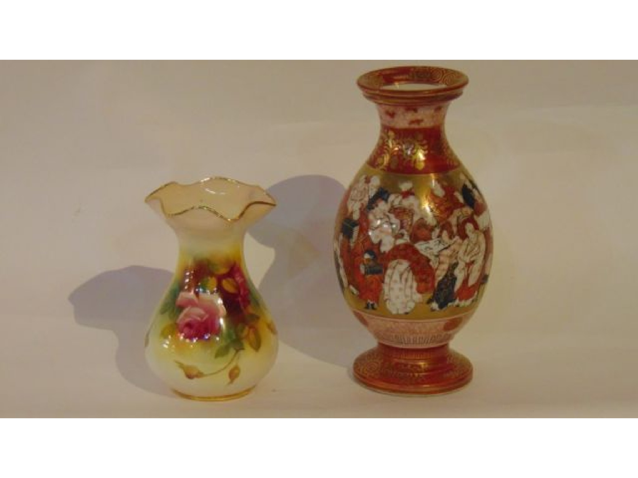 Appraisal: A Royal Worcester vase with shaped rim and painted pink