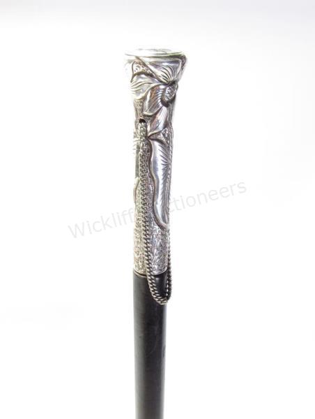 Appraisal: Silver Handled Dress Cane silver handle with chain and floral