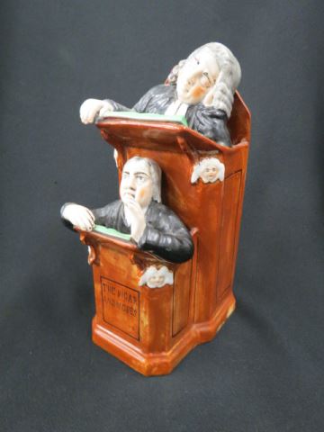 Appraisal: Staffordshire Pottery Figurine The Vicar and Moses marked R Wood