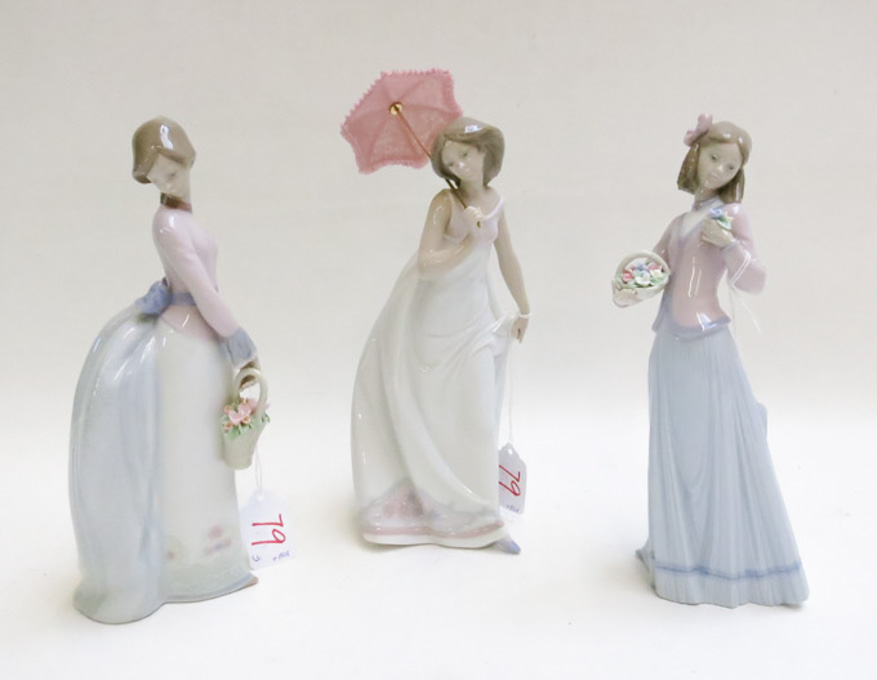 Appraisal: THREE LLADRO PORCELAIN FIGURINES by sculptor Jose Puche Afternoon Promenade