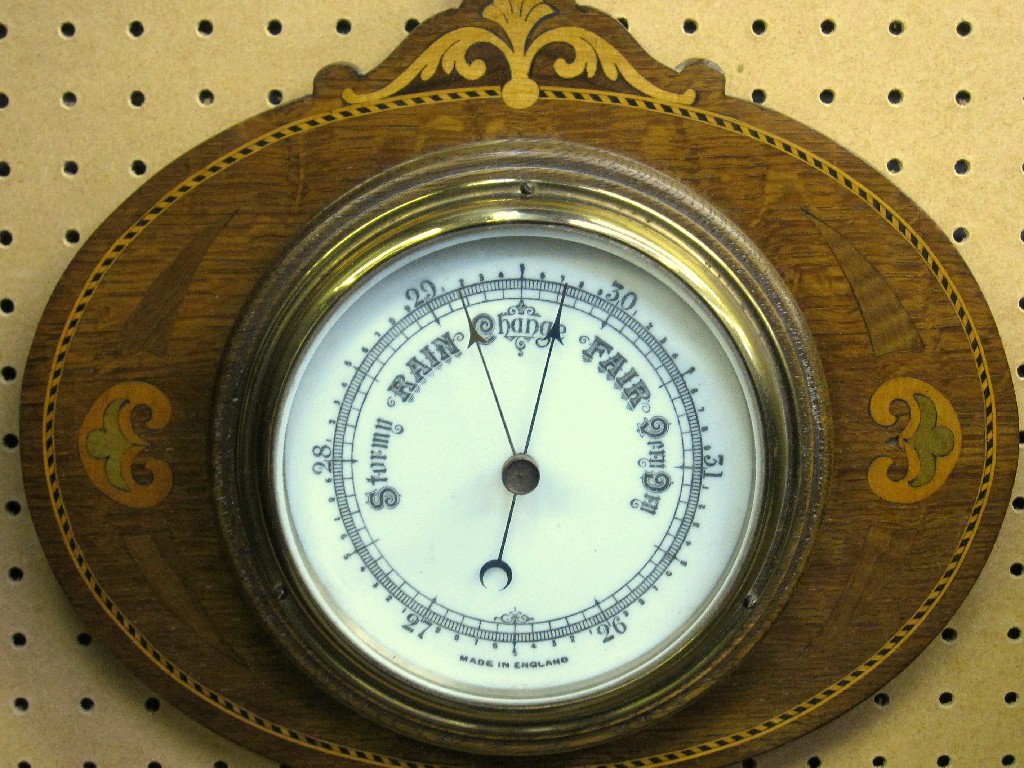 Appraisal: Oak framed barometer on inlaid wooden panel