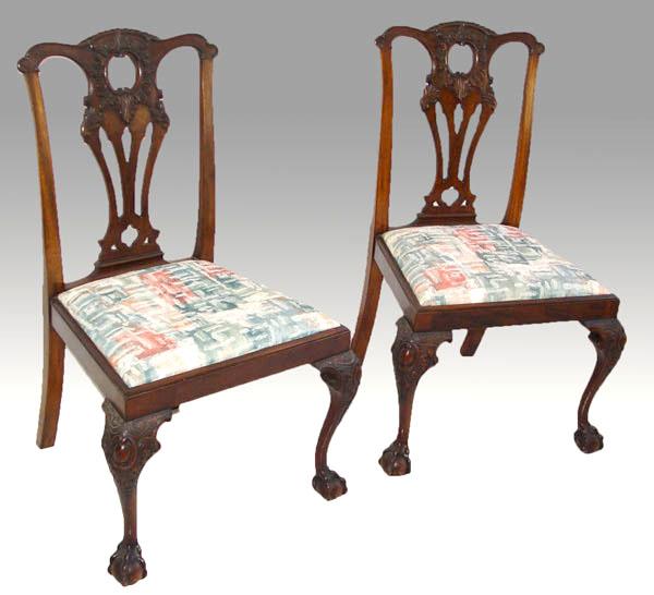 Appraisal: PAIR OF MAHOGANY CHIPPENDALE STYLE CHAIRS Carved front legs with