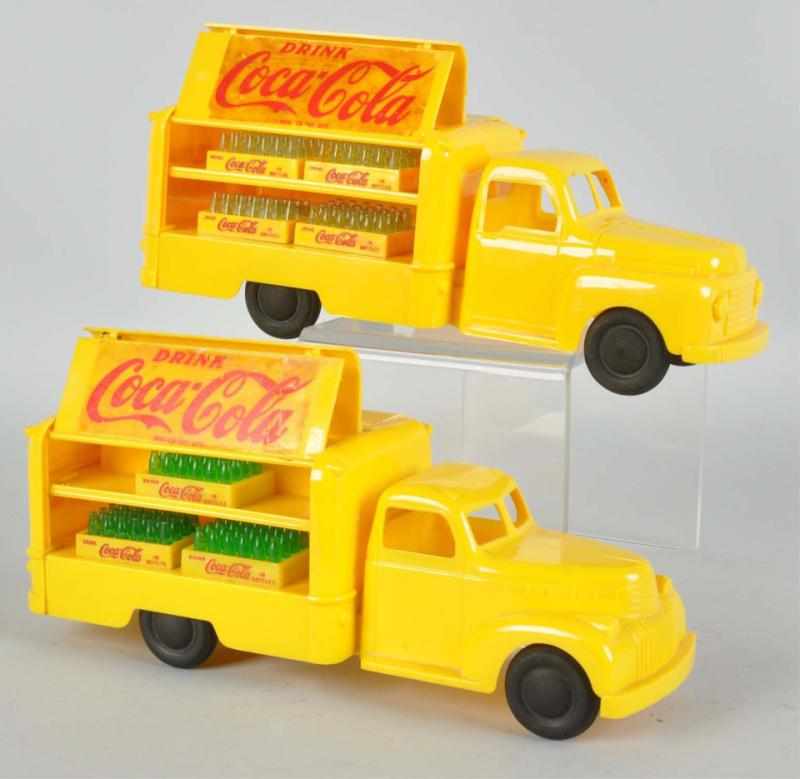 Appraisal: Lot of Coca-Cola Marx Toy Trucks Description to Includes two