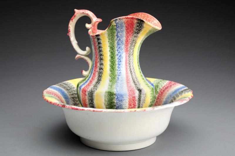 Appraisal: Extremely Rare -Color Rainbow Spatterware Set Made in the first