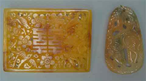 Appraisal: TWO CHINESE CARVINGS AMBER AND JADEITE including an export amber