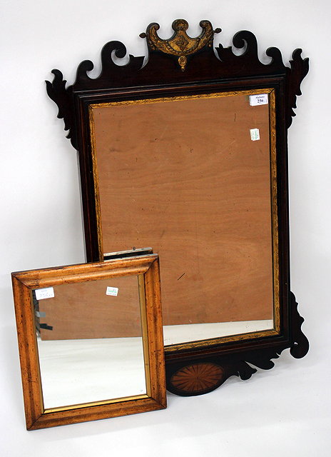 Appraisal: A GEORGE III MAHOGANY FRET FRAMED WALL MIRROR cm wide