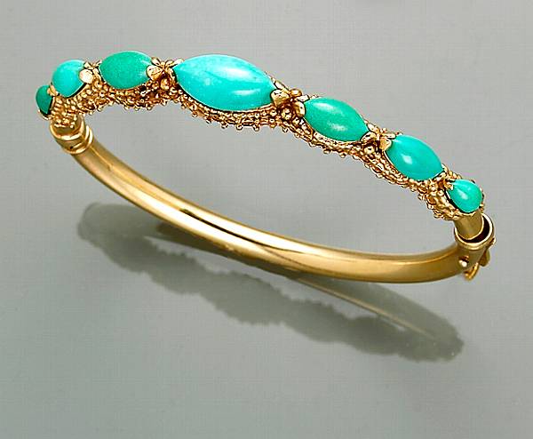 Appraisal: A turquoise and fourteen karat gold bangle bracelet size in