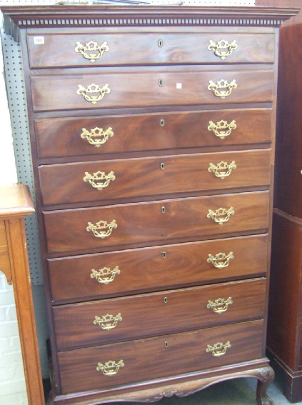 Appraisal: A part th century mahogany tall chest the dentil cornice