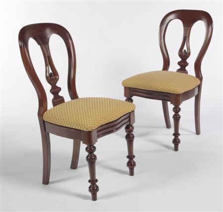 Appraisal: A set of eight Victorian mahogany spoon back dining chairs