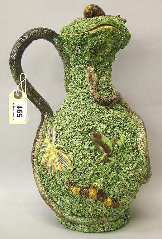 Appraisal: Palissy style ewer and cover with snake handle snail knop