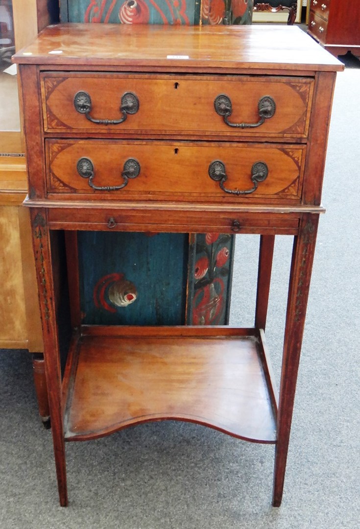 Appraisal: A th century tulipwood banded mahogany two drawer chest on