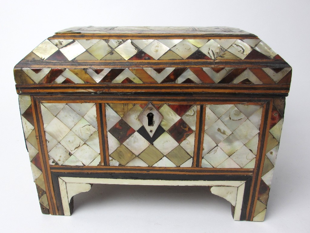 Appraisal: An Ottoman jewellery box with geometric shell panels divided by