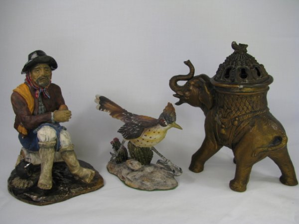 Appraisal: Two ceramic figurines - Miner high by wide by deep