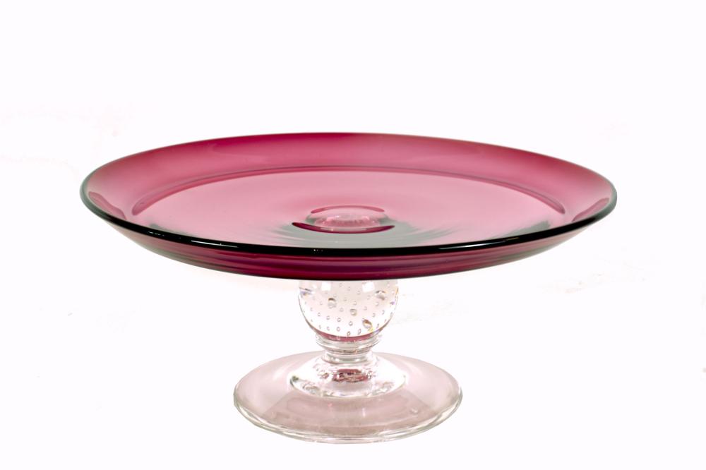 Appraisal: PAIRPOINT CRANBERRY GLASS CAKE STANDThe dished circular plate atop a