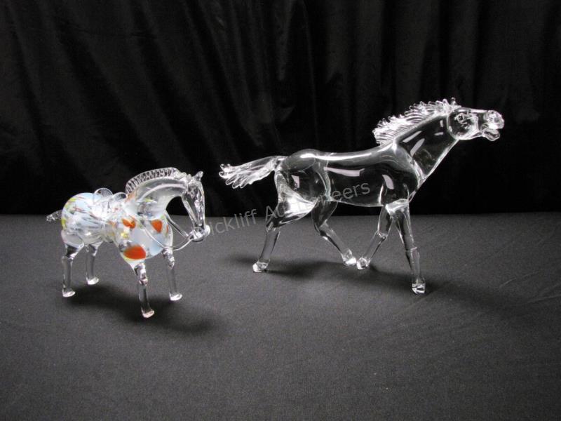 Appraisal: Two Glass Horse Sculptures large clear solid glass horse flowing