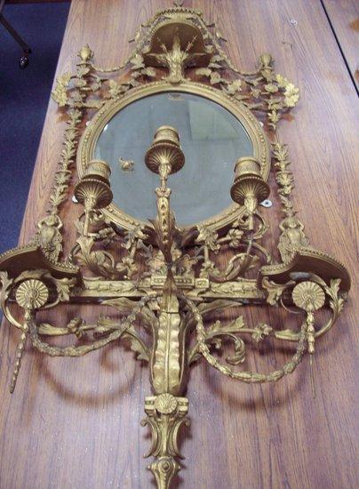 Appraisal: A Victorian girondelle with urn surround and trails of grapes