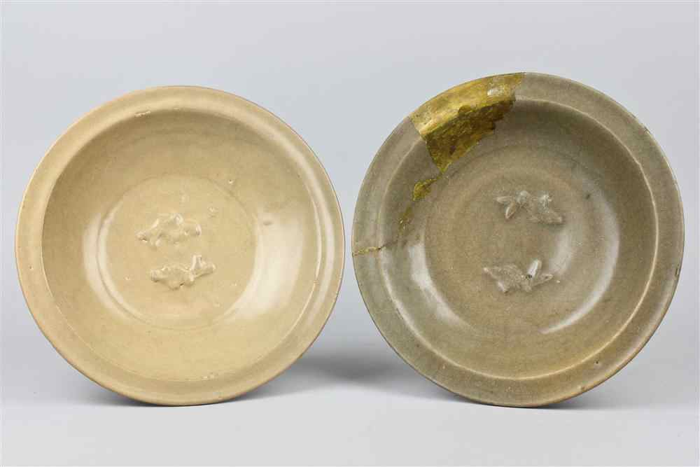 Appraisal: TWO CHINESE CELADON MOLDED FISH BOWLS SONG DYNASTY each potted