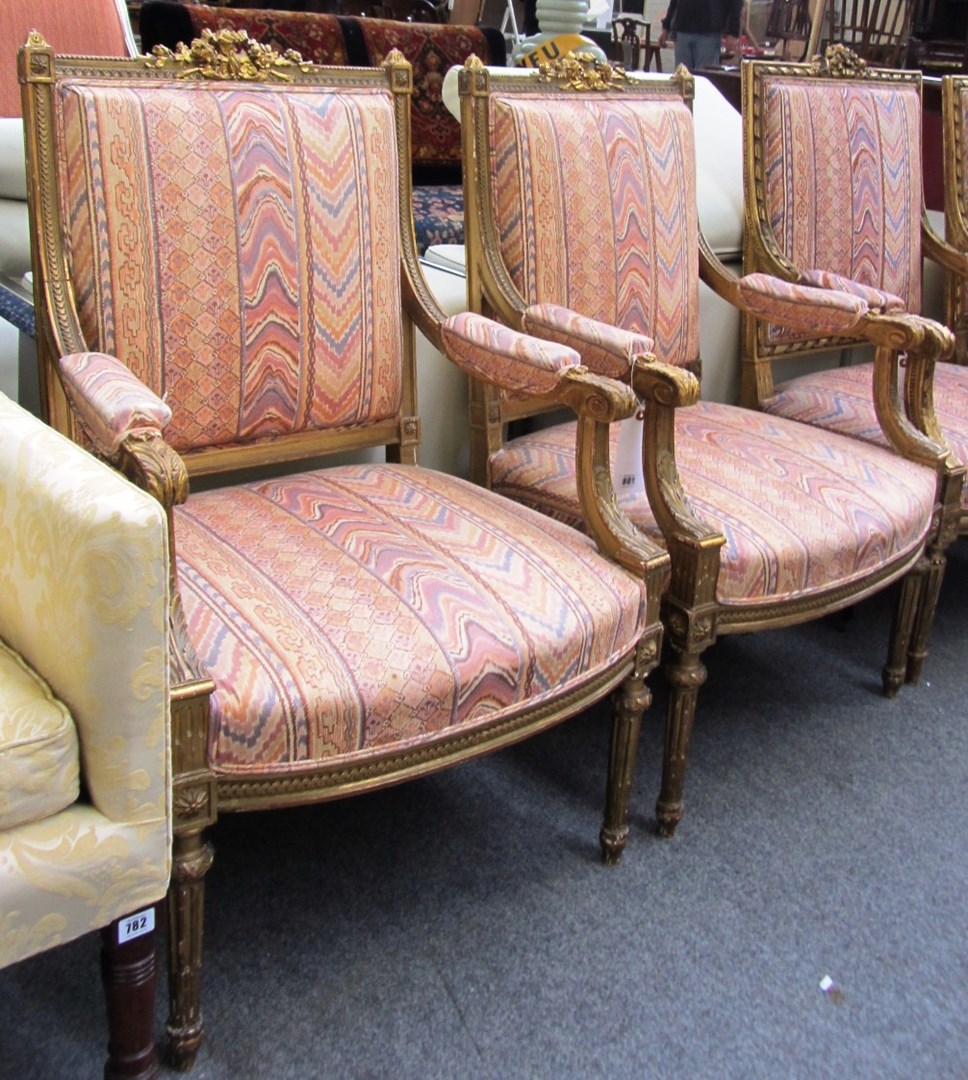 Appraisal: A pair of late th century gilt framed fauteuils of