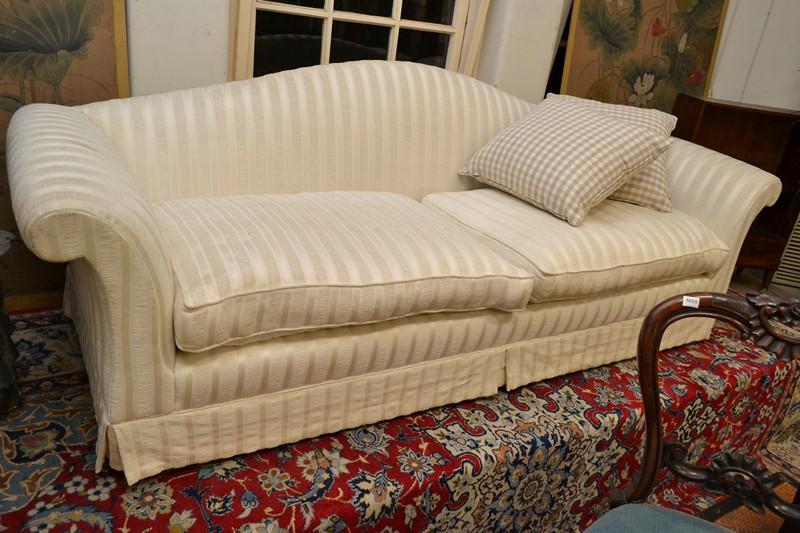 Appraisal: A PAIR OF CONTEMPORARY SOFAS IN CLASSICAL WHITE STRIPED UPHOLSTERY