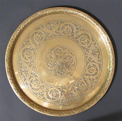 Appraisal: An Aesthetic Movement brass tray designed by Dr Christopher Dresser