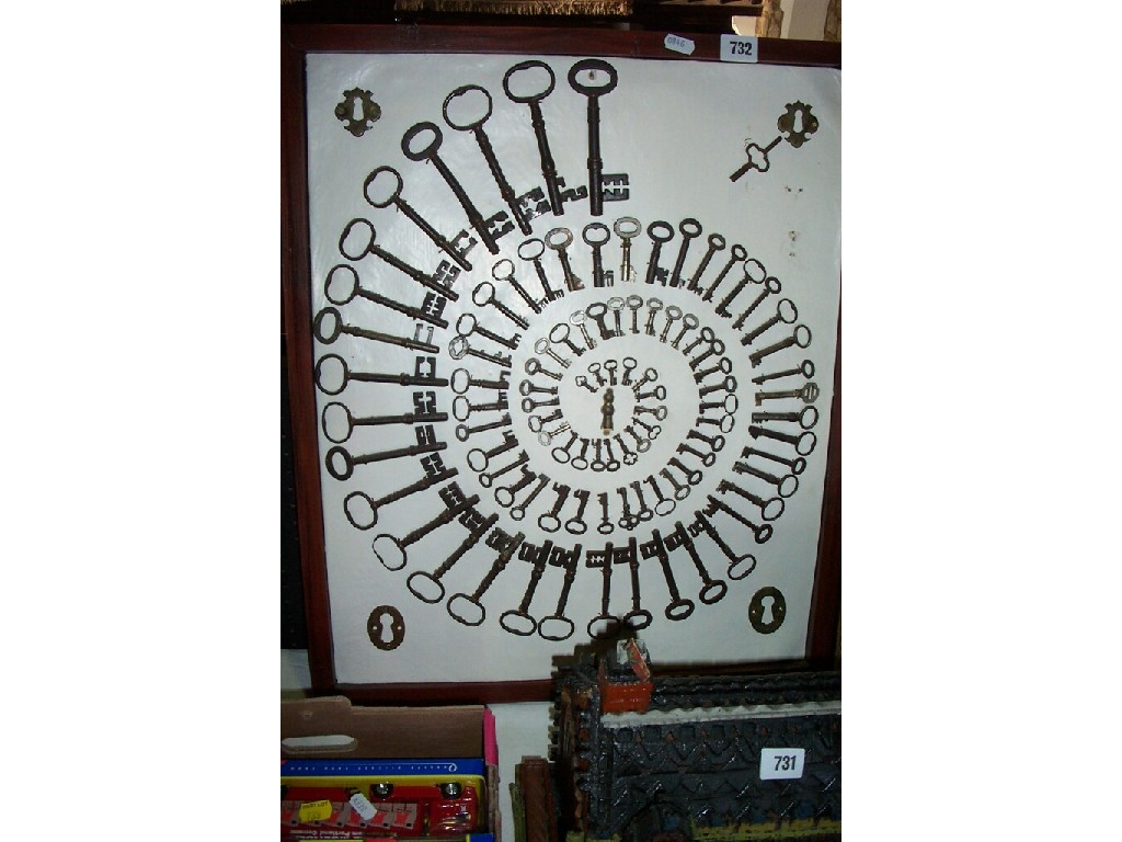 Appraisal: A display of th century and other decorative ironwork keys