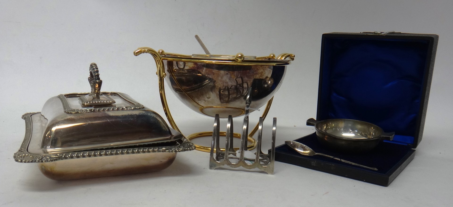 Appraisal: A silver and gold plated caviar cooler formed as a