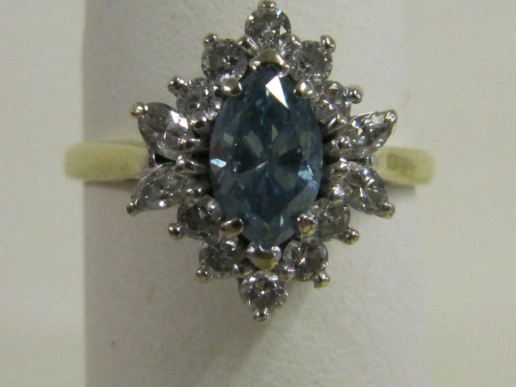 Appraisal: Eighteen carat gold blue and white diamond cluster ring with